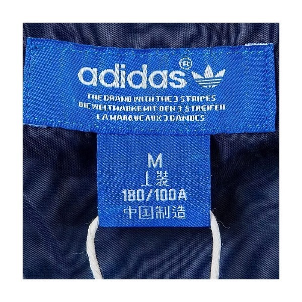 三叶草羽绒服领标真伪的问题