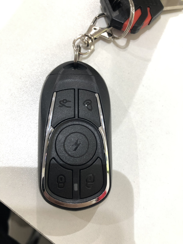 台铃电动车钥匙上按钮做什么用的?