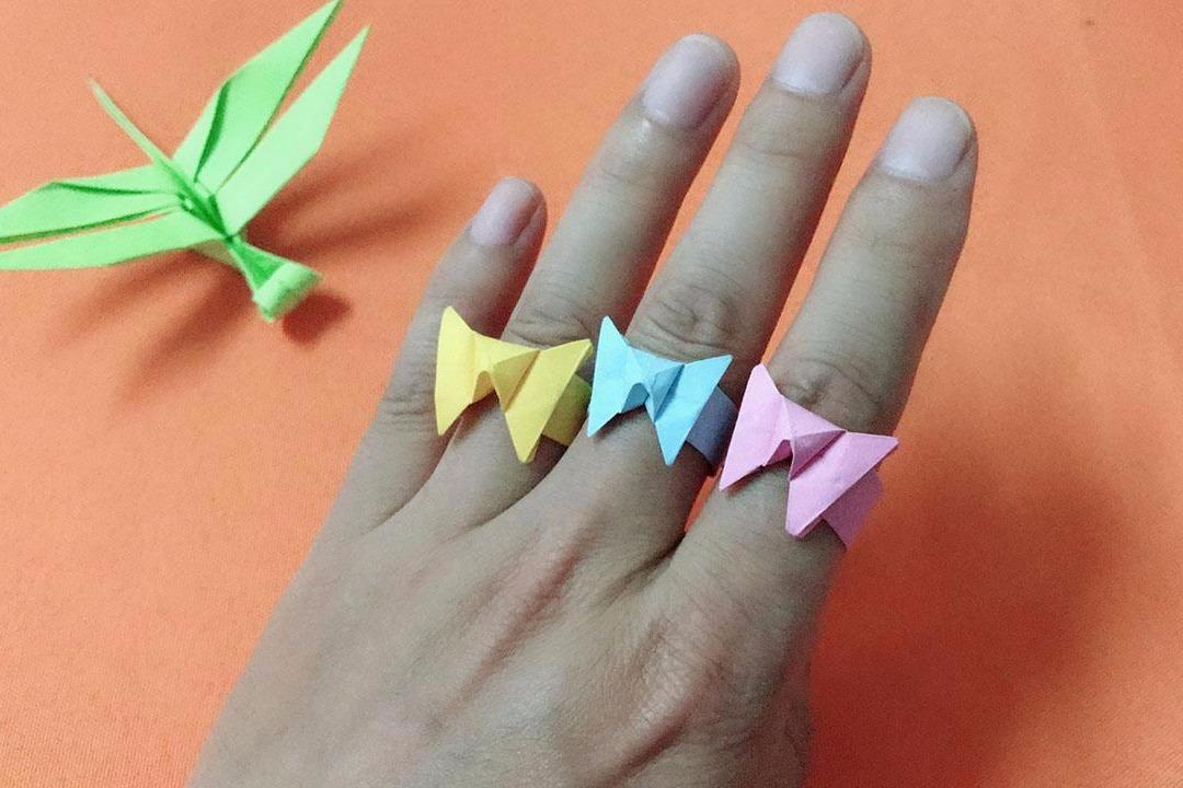 视频:漂亮的折纸蝴蝶戒指,简单两步,一张纸重复折,两分钟折好