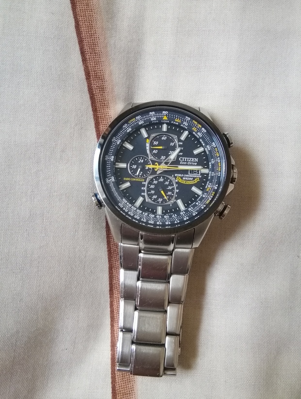 西铁城e870-s096081光动能手表怎么调日期?