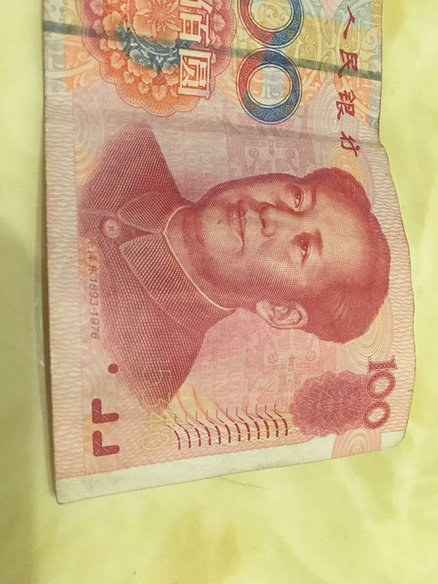 我从取款机里取到一张钱,不知道是不是错版的如何用香水月季做花瓣图片
