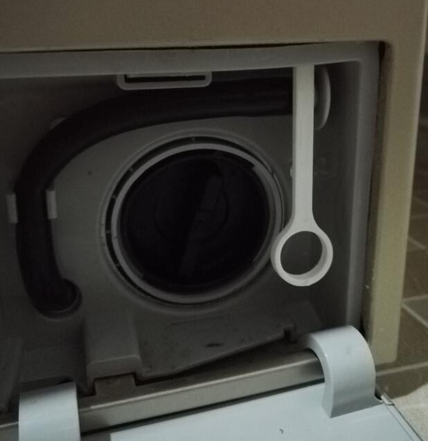 海尔滚筒洗衣机右下角拉环的作用?