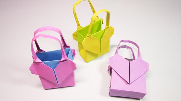 视频:儿童手工折纸包包 简单爱心手提包的折法