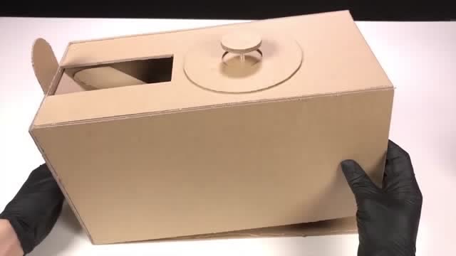 国外 手工制作,将 纸盒里面做成滑梯样子, 盒子外部纸板包严