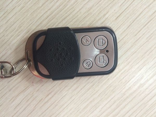 电动卷帘门的钥匙是配的 不知道怎么用 求解 在线等 急 谢谢!