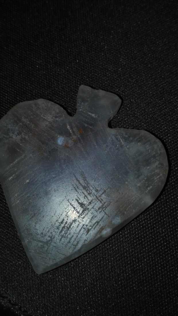 石头冲着阳光看有水纹和水草,好奇心让我把它切割成了心型