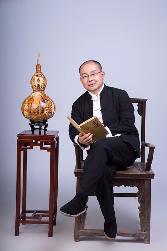 张成是一国学老师