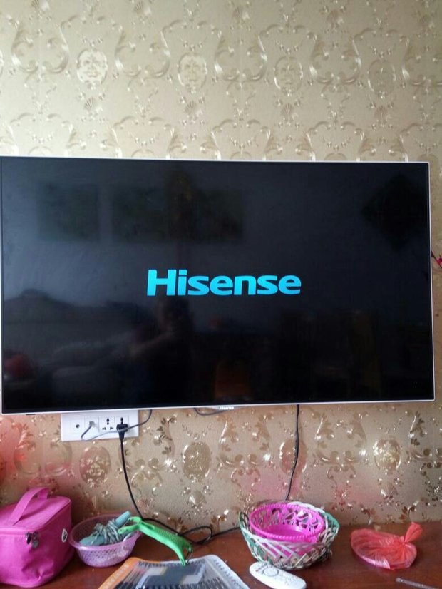 海信电视开机画面停留在英文画面,进不去系统