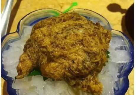 帝王蟹蟹黄是类似线状的黄色物体,有点像寄生虫.