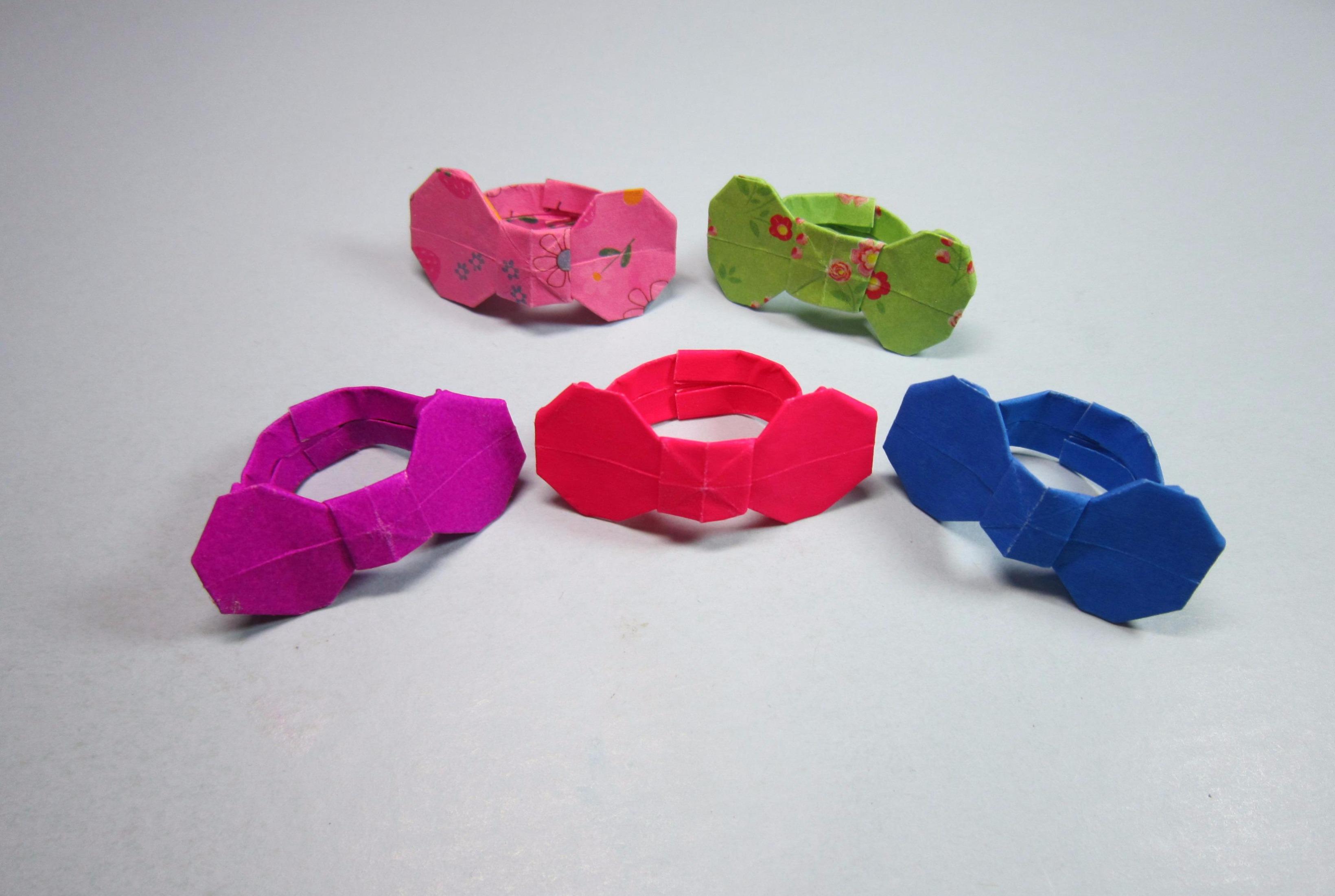 视频:儿童手工折纸戒指,步骤简单又漂亮的蝴蝶结戒指的折法