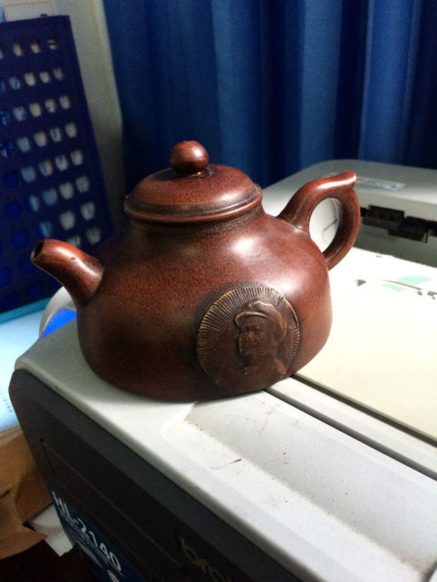 请问这是吴月亭的紫砂壶是真的吗?