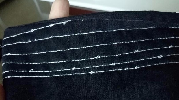 缝纫机缝出来背面变成这样怎么办?