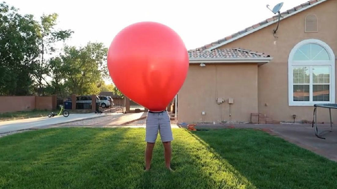 头上套一个大气球,能不 能飞上天,像鸟一样 飞翔