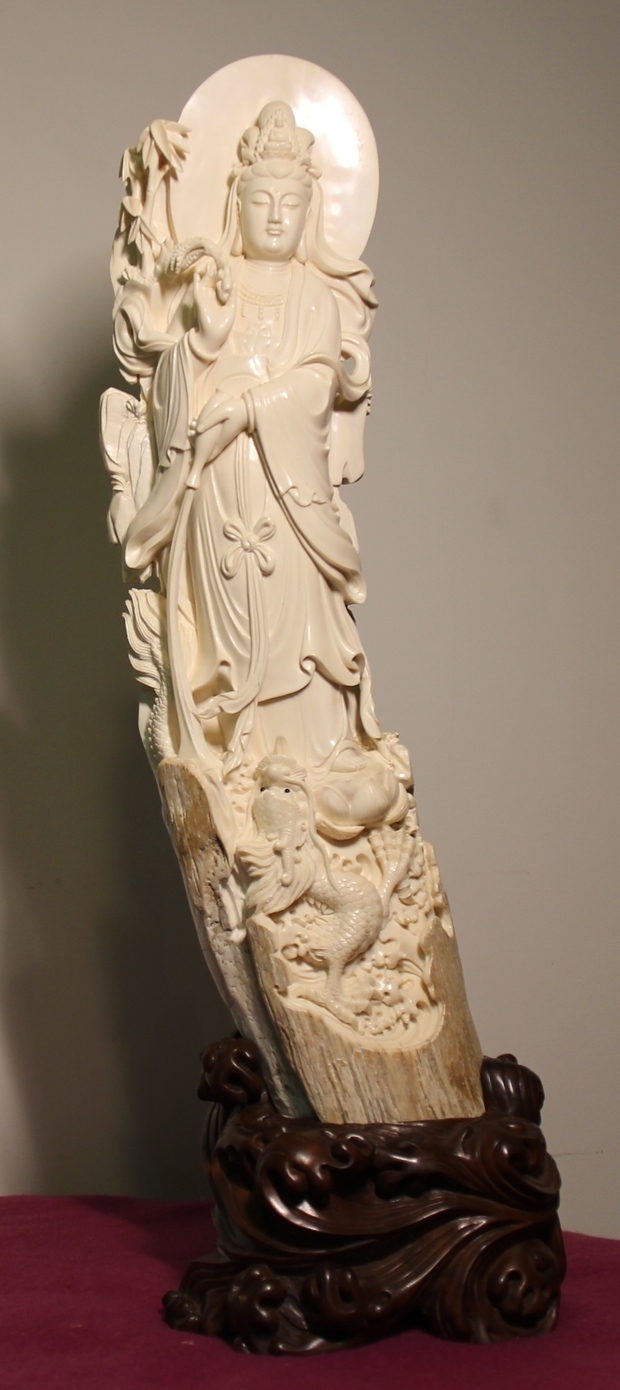 猛犸象牙观音像 高56cm 和54cm,请问现在值多少钱