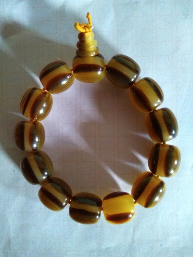 这个牛角手串是假的吗