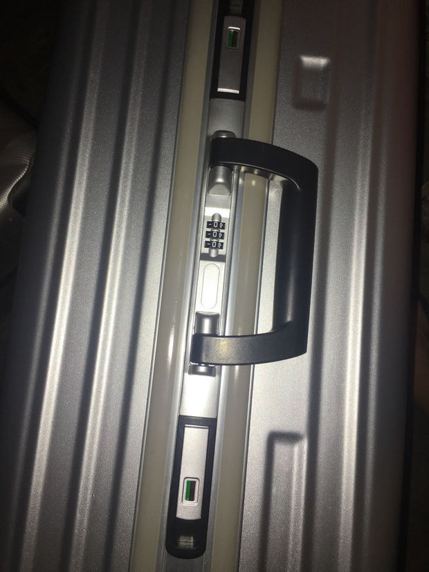 铝框行李箱箱怎么设置密码