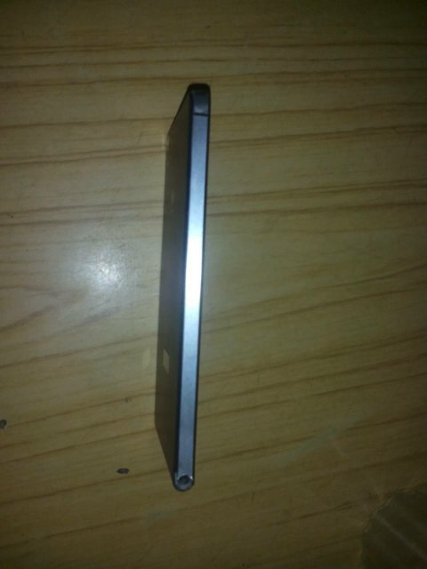 华为手机后盖怎么打开或者说应该怎么装卡,请