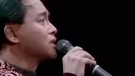 张国荣风继续吹这首歌表达什么意思?我男同事