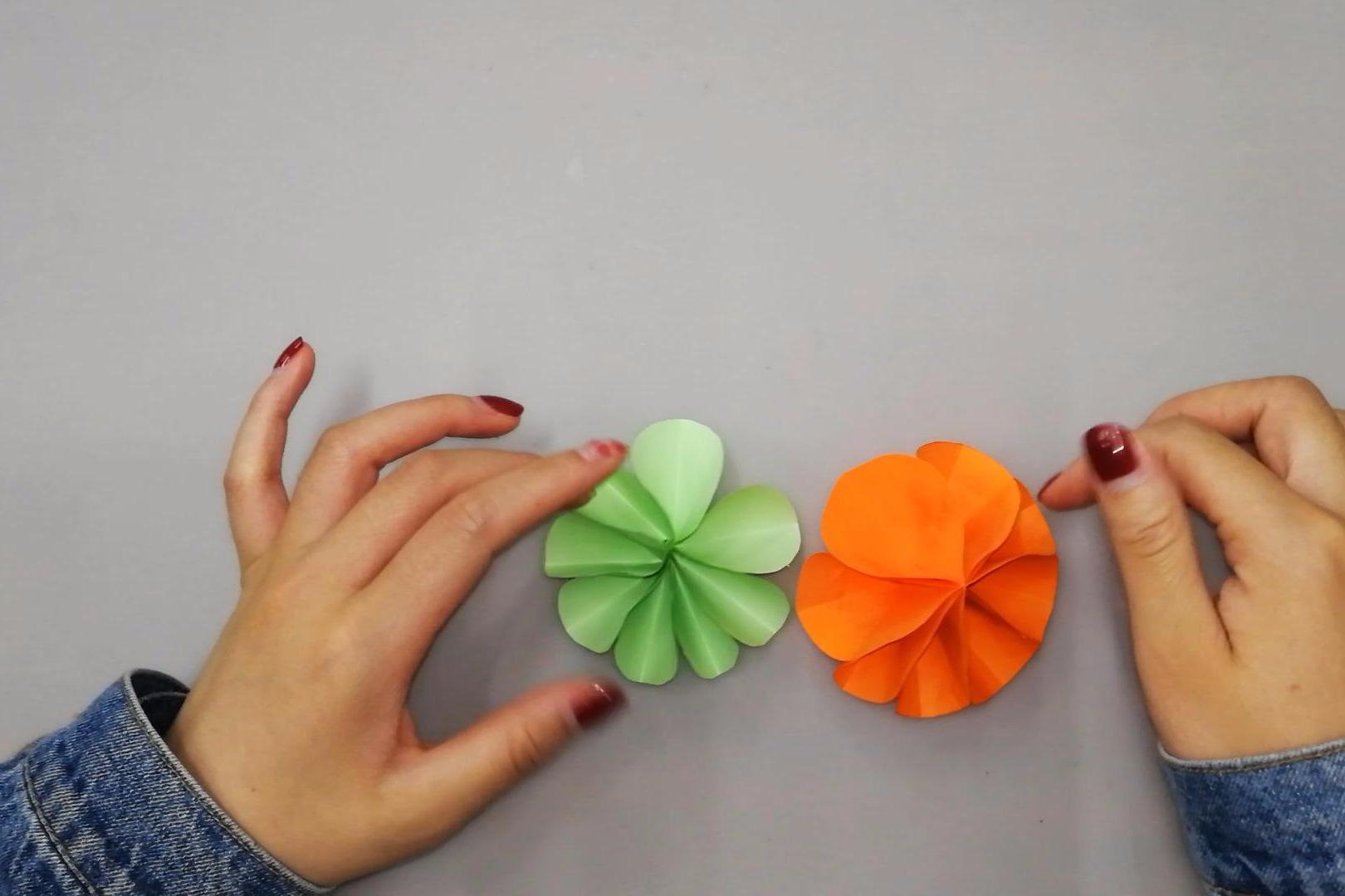 视频:精美的圆形花折纸,一分钟能折好几个,手工折纸视频