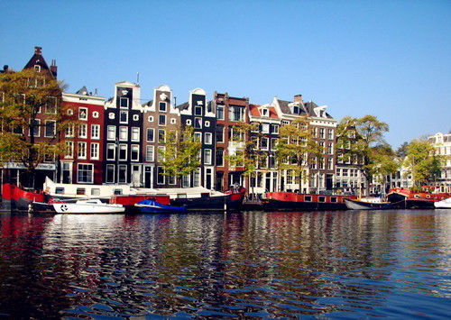 荷兰为什么被称为风车之国,运河之国