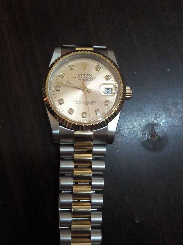 朋友送的,劳力士 750 8385 18k 谁能帮我看看真的假的? 谢谢