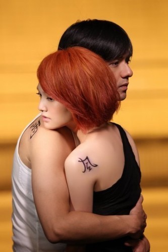 杨丞琳有一只mv中男女主角脖子后面有风和雨的纹身是哪首歌