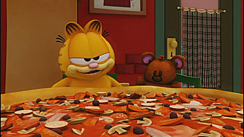  b>加菲猫 /b>: b>加菲猫 /b>点的披萨比桌子还大,乔恩和欧迪都看不