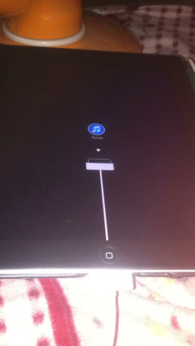ipad2 升完级了一开机就只显示itunes和一个充