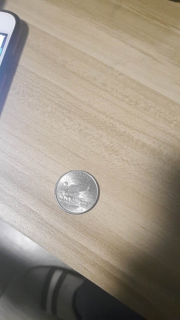 这是25美分的硬币么? 介绍一下 这样的背面好像很少见