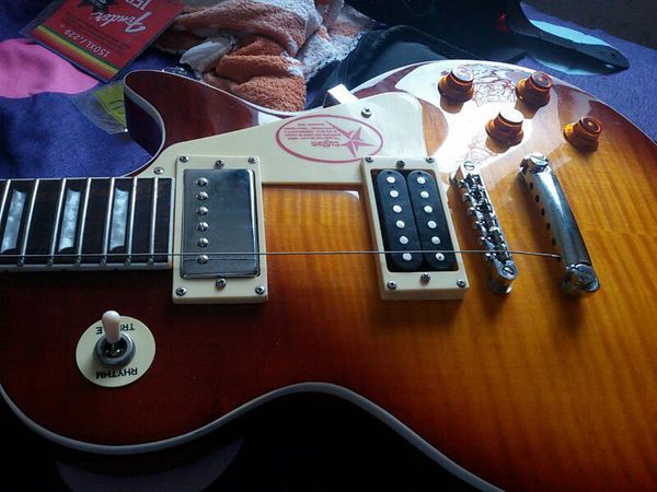 电吉他换弦压品