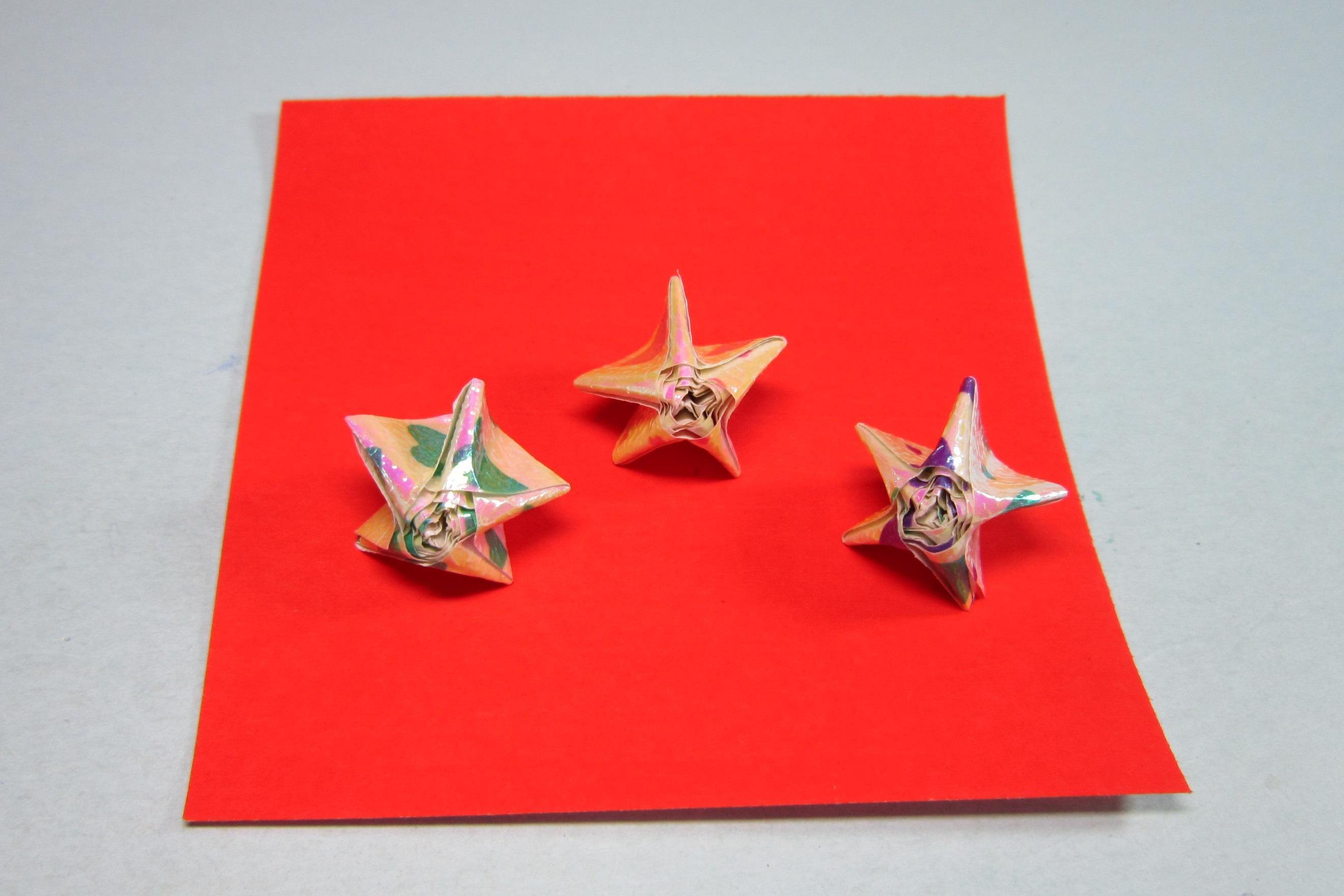 视频:创意diy手工折纸小星星,2根小纸条折出漂亮的立体五角星