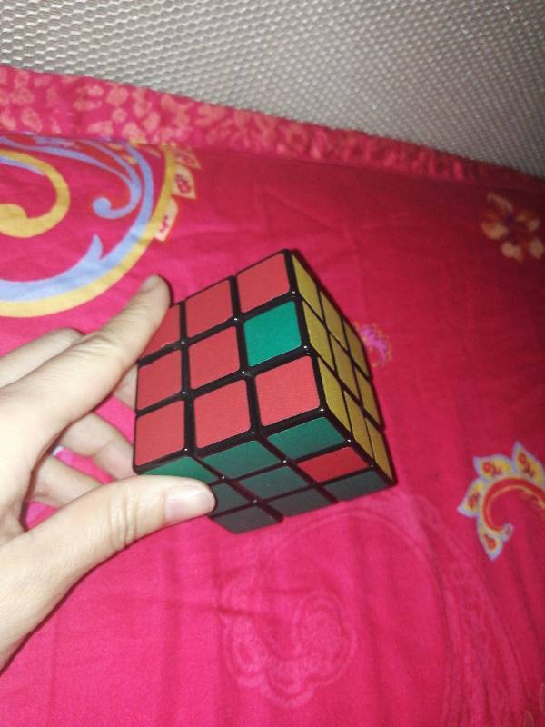 三阶魔方如图怎么恢复,请大神赐教!