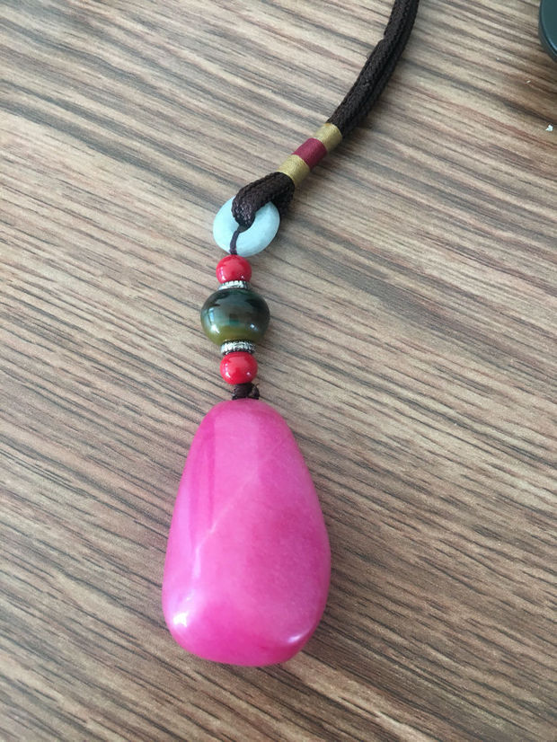 这个是什么石头粉红色手感石头有光泽不透明