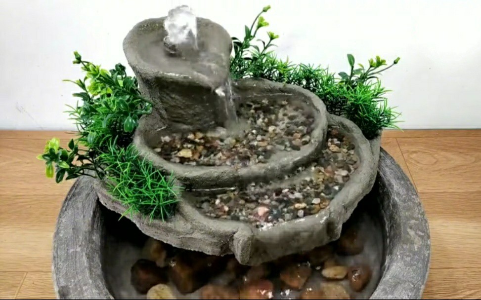 采用水泥,硬纸板, 泡沫板等材料制作流水摆件