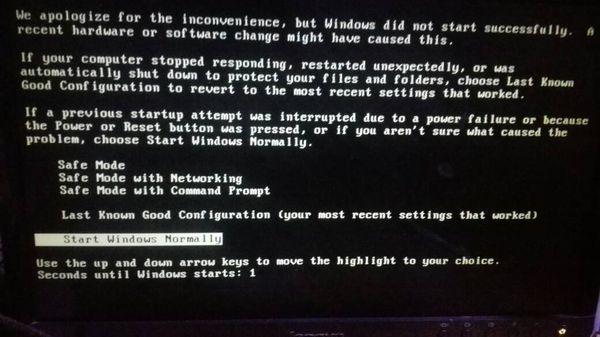 电脑开机一直黑屏,有英文,然后就跳一下蓝屏,接