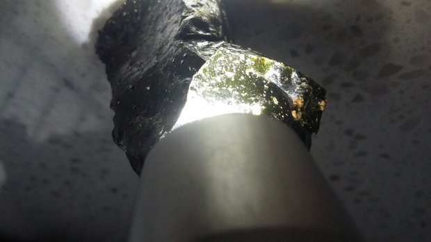 玻璃油子与陨石区别