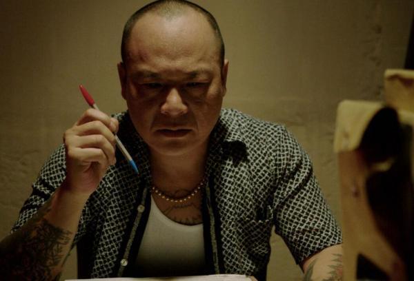 古惑仔扮演笑面虎的那个人叫什么名字?